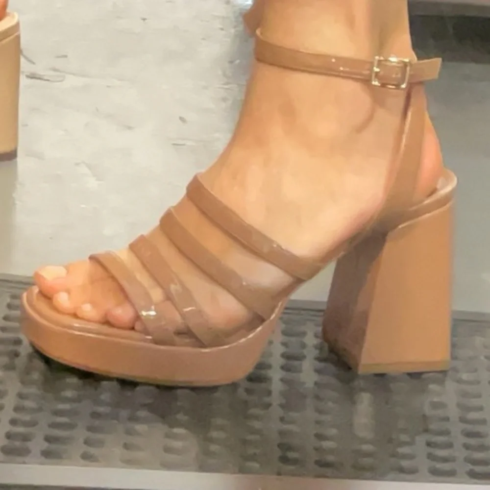 Nude NINE WEST strappy platform heels size 7M
